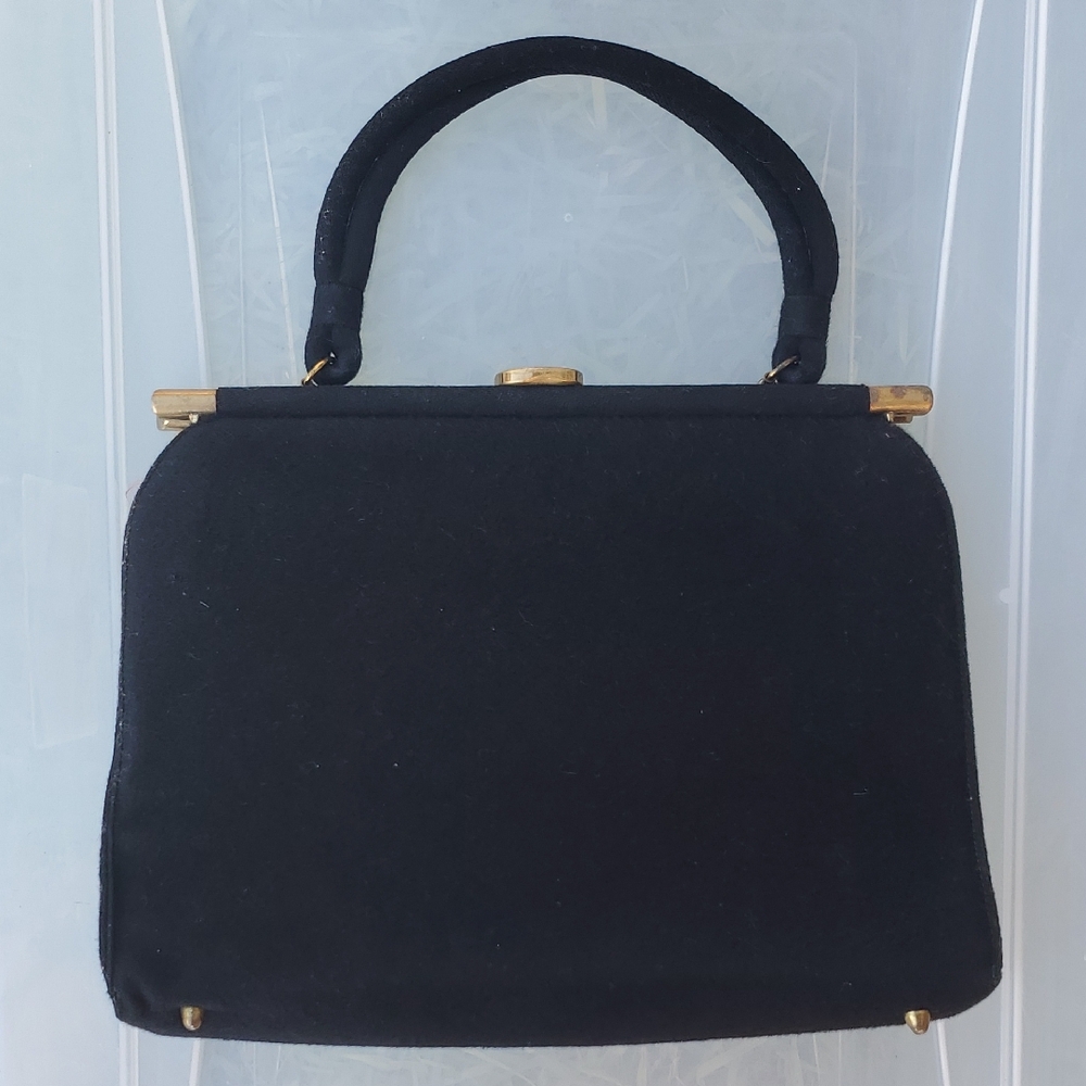 Chic Black Satchel with Gold Accents